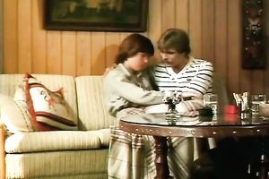 Redhead classic German playgirl giving head on the ottoman