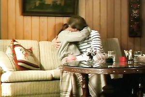 Redhead classic German playgirl giving head on the ottoman