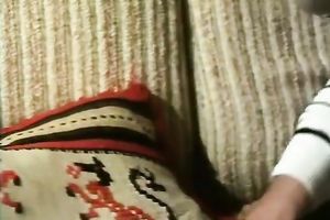 Redhead classic German playgirl giving head on the ottoman