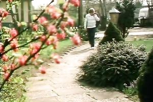 Redhead classic German playgirl giving head on the ottoman