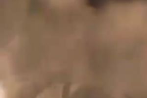 Lubricious dark brown gal in fishnet nylons serves her pussy for hard pounding