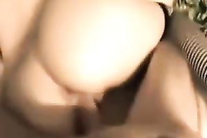 Lubricious dark brown gal in fishnet nylons serves her pussy for hard pounding