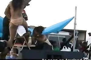 Dirty ebony doxies were engulfing dick in front of the crowd