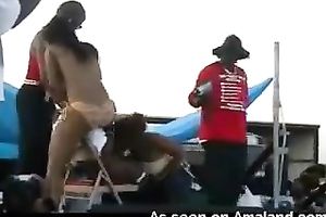 Dirty ebony doxies were engulfing dick in front of the crowd