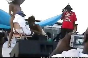 Dirty ebony doxies were engulfing dick in front of the crowd