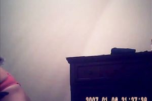 Hidden camera of lustful bulky dark brown putting on her raiment after shower