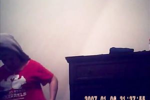 Hidden camera of lustful bulky dark brown putting on her raiment after shower