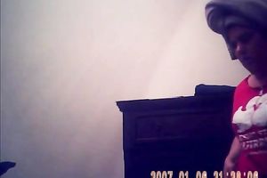 Hidden camera of lustful bulky dark brown putting on her raiment after shower