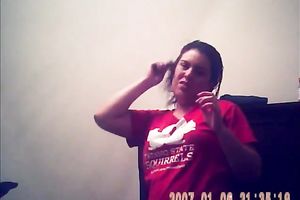 Hidden camera of lustful bulky dark brown putting on her raiment after shower