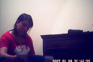 Hidden camera of lustful bulky dark brown putting on her raiment after shower