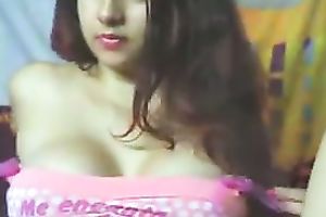 Sexy and breasty dark brown latina teases me on web camera with her large boobies
