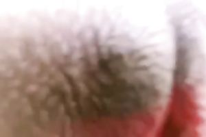 Red haired wench with large gazoo showing her fuck holes closeup