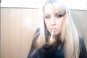 Blonde sexy doxy smokes on web camera to tease me and puff smoke in my face