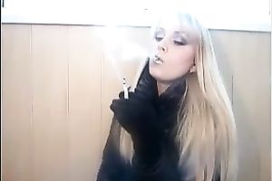 Blonde sexy doxy smokes on web camera to tease me and puff smoke in my face