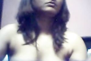 Amateur Indian juvenile chick flashes her large milk shakes on web camera