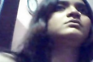 Amateur Indian juvenile chick flashes her large milk shakes on web camera