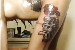 Heavily tattooed temptress from Saint Louis shows off her curves