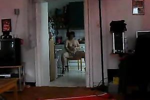 My fat breasty brunette hair wife walking topless on webcam