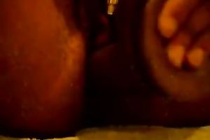 Kinky non-professional large bottomed black nympho teases her pussy with vibrator