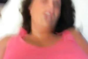 Chubby older brunette masturbates in front of a livecam