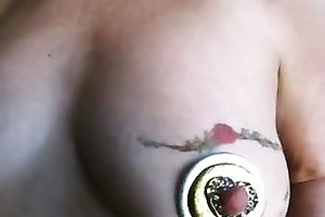 Tattooed breast of my wife looks like an eye with that jewelry