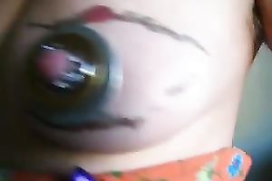 Tattooed breast of my wife looks like an eye with that jewelry