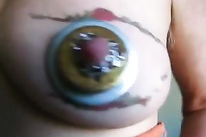 Tattooed breast of my wife looks like an eye with that jewelry