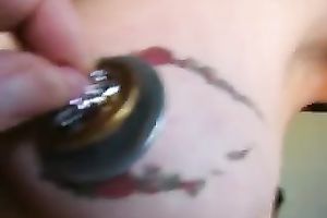 Tattooed breast of my wife looks like an eye with that jewelry