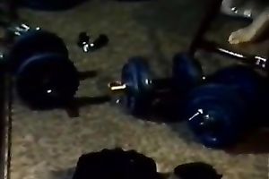 Greased up classic blond chick eats cock in the gym