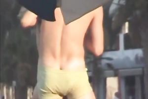 Sweet lean dark brown honey topless on the beach getting groped