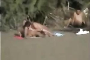 I spied on this barefaced pair fucking on the beach