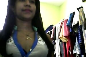 Sizzling Indian gal posing and stripping seductively in front of camera