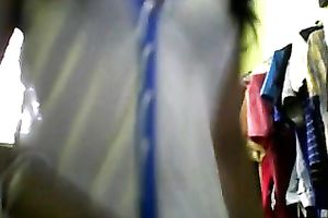 Sizzling Indian gal posing and stripping seductively in front of camera