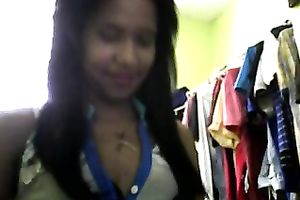 Sizzling Indian gal posing and stripping seductively in front of camera