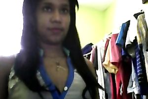 Sizzling Indian gal posing and stripping seductively in front of camera