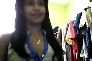 Sizzling Indian gal posing and stripping seductively in front of camera
