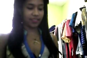 Sizzling Indian gal posing and stripping seductively in front of camera