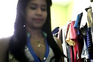 Sizzling Indian gal posing and stripping seductively in front of camera