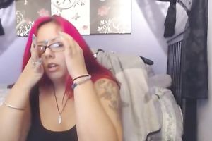 Red haired Latina web camera doxy was showing off her giant bum