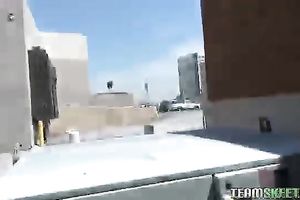 Kinky non-professional smiling brunette hair gives nice irrumation near the mall