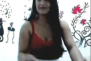 Exotic looking white women shows her big boobies on cam