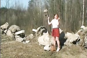 Marvelous redhead white BBC slut in the woods strips and pisses on the rock