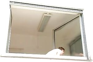 Magnificent and breasty blond honey washed the windows topless