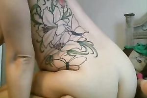 Fine looking livecam slut with a nice tattoo on her back is masturbating for me