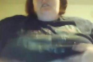 Disgusting short-haired big beautiful woman plays with her tits and naughty pussy