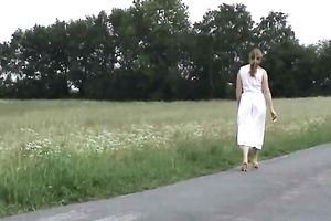 My romantic babe shows off her bawdy soles outdoors