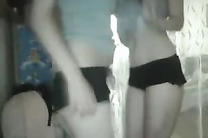 Two skanky legal age teenager girls dancing seductively in front of camera