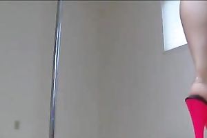 Hot golden-haired skank dances on the pole and plugs her butthole