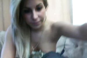 Outrageous blond playgirl gently fingers her rectal hole on web camera