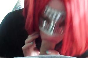 Red haired wench in facial mask giving me deepthroat oral-stimulation